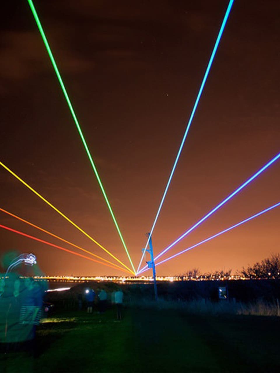 Sharp Long-Distance Beams